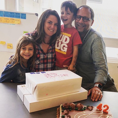 Courtney with her partner and children.